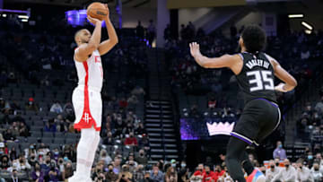 SACRAMENTO, CALIFORNIA - JANUARY 14: Eric Gordon #10 of the Houston Rockets shoots a three-point shot over Marvin Bagley III #35 of the Sacramento Kings during the fourth quarter at Golden 1 Center on January 14, 2022 in Sacramento, California. NOTE TO USER: User expressly acknowledges and agrees that, by downloading and/or using this photograph, User is consenting to the terms and conditions of the Getty Images License Agreement. (Photo by Thearon W. Henderson/Getty Images)