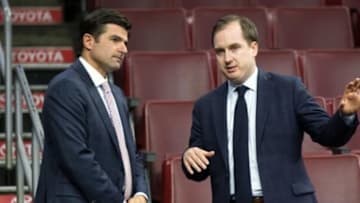 Oct 8, 2015; Philadelphia, PA, USA; Philadelphia 76ers general manager Sam Hinkie (R) talks with chief executive officer Scott O