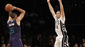 Nov 4, 2016; Brooklyn, NY, USA; Brooklyn Nets guard Bojan Bogdanovic (44) defends against Charlotte Hornets guard Nicolas Batum (5) in the fourth quarter at Barclays Center. Hornets win 99-95. Mandatory Credit: Nicole Sweet-USA TODAY Sports
