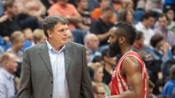 Apr 11, 2014; Minneapolis, MN, USA; Houston Rockets head coach Kevin McHale talks to guard James Harden (13) in the second quarter against the Minnesota Timberwolves at Target Center. Mandatory Credit: Brad Rempel-USA TODAY Sports