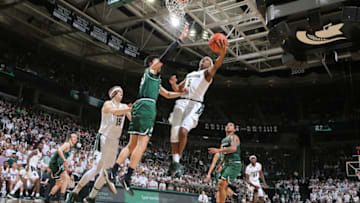 EAST LANSING, MI - NOVEMBER 10: Cassius Winston #5 of the Michigan State Spartans shoots a lay up against George Tinsley #20 of the Binghamton Bearcats in the second half at Breslin Center on November 10, 2019 in East Lansing, Michigan. (Photo by Rey Del Rio/Getty Images)