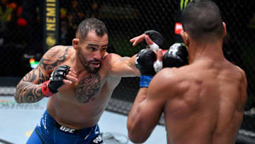 LAS VEGAS, NEVADA - JUNE 05: (L-R) Santiago Ponzinibbio of Argentina punches Miguel Baeza in a welterweight fight during the UFC Fight Night event at UFC APEX on June 05, 2021 in Las Vegas, Nevada. (Photo by Jeff Bottari/Zuffa LLC)