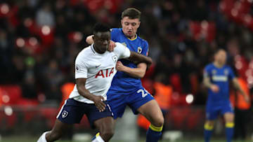 LONDON, ENGLAND - JANUARY 07: Victor Wanyama of Tottenham Hotspur and Anthony Hartigan of AFC Wimbledon battle for the ball during The Emirates FA Cup Third Round match between Tottenham Hotspur and AFC Wimbledon at Wembley Stadium on January 7, 2018 in London, England. (Photo by Matthew Lewis/Getty Images)