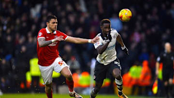 LONDON, ENGLAND - FEBRUARY 20: Moussa Dembele of Fulham FC and Jorge Teixeira of Charlton FC during the Sky Bet Championship match between Fulham and Charlton Athletic at Craven Cottage on February 20, 2016 in London, United Kingdom. (Photo by Justin Setterfield/Getty Images)