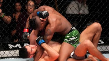 LAS VEGAS, NEVADA - FEBRUARY 26: (R-L) Terrance McKinney punches Fares Ziam of France in their lightweight fight during the UFC Fight Night event at UFC APEX on February 26, 2022 in Las Vegas, Nevada. (Photo by Chris Unger/Zuffa LLC)