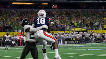 Auburn football wide receiver Seth Williams (18) catches the game winning touchdown pass guarded by Oregon defensive back Verone McKinley III (23) at AT&T Stadium in Arlington, Texas, on Saturday, Aug. 31, 2019. Auburn defeated Oregon 27-21.Jc Auburnoregon 60