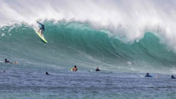 US surfer John John Florence rides the waves at Sunset beach on the North shore of Oahu, Hawaii on May 1, 2021. - -- IMAGE RESTRICTED TO EDITORIAL USE - STRICTLY NO COMMERCIAL USE -- (Photo by Brian BIELMANN / AFP) / -- IMAGE RESTRICTED TO EDITORIAL USE - STRICTLY NO COMMERCIAL USE -- (Photo by BRIAN BIELMANN/AFP via Getty Images)