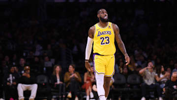 LOS ANGELES, CALIFORNIA - OCTOBER 13: LeBron James #23 of the Los Angeles Lakers waits during a 129-125 loss to the Golden State Warriors in a preseason game at Crypto.com Arena on October 13, 2023 in Los Angeles, California. (Photo by Harry How/Getty Images) NOTE TO USER: User expressly acknowledges and agrees that, by downloading and/or using this photograph, user is consenting to the terms and conditions of the Getty Images License Agreement. (Photo by Harry How/Getty Images)