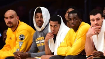 LOS ANGELES, CA - JANUARY 05: (L-R) Robert Sacre #50, Nick Young #0, Jordan Clarkson #6, Brandon Bass #2 and Larry Nance Jr. #7 of the Los Angeles Lakers watch play during a 109-88 loss to the Golden State Warriors at Staples Center on January 5, 2016 in Los Angeles, California. NOTE TO USER: User expressly acknowledges and agrees that, by downloading and or using this Photograph, user is consenting to the terms and condition of the Getty Images License Agreement. (Photo by Harry How/Getty Images)