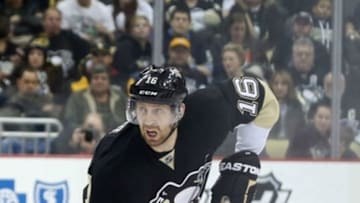 Jan 26, 2016; Pittsburgh, PA, USA; Pittsburgh Penguins right wing Eric Fehr (16) carries the puck against the New Jersey Devils during the second period at the CONSOL Energy Center. The Penguins won 2-0. Mandatory Credit: Charles LeClaire-USA TODAY Sports