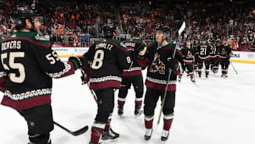 GLENDALE, ARIZONA - JANUARY 04: Clayton Keller #9 of the Arizona Coyotes congratulates Nick Schmaltz #8, Jason Demers #55 and teammates following a 6-2 victory against the Philadelphia Flyers during the NHL hockey game at Gila River Arena on January 04, 2020 in Glendale, Arizona. (Photo by Norm Hall/NHLI via Getty Images)