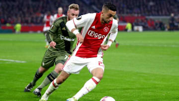 AMSTERDAM, NETHERLANDS - FEBRUARY 23: Hakim Ziyech of Ajax is watched by Mihail Aleksandrov of Legia Warszawa during the UEFA Europa League Round of 32 second leg match between Ajax Amsterdam and Legia Warszawa at Amsterdam Arena on February 23, 2017 in Amsterdam, Netherlands. (Photo by Dean Mouhtaropoulos/Getty Images)