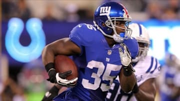 Aug 18, 2013; East Rutherford, NJ, USA; New York Giants running back Andre Brown (35) runs against the Indianapolis Colts during the first quarter of a preseason game at MetLife Stadium. Mandatory Credit: Brad Penner-USA TODAY Sports