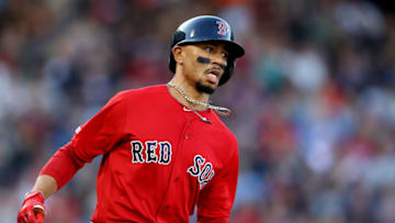 BOSTON, MASSACHUSETTS - SEPTEMBER 29: Mookie Betts #50 of the Boston Red Sox runs to first base during the fifth inning against the Baltimore Orioles at Fenway Park on September 29, 2019 in Boston, Massachusetts. (Photo by Maddie Meyer/Getty Images)