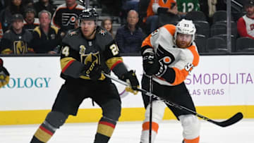 LAS VEGAS, NV - FEBRUARY 11: Jakub Voracek #93 of the Philadelphia Flyers passes against against Oscar Lindberg #24 of the Vegas Golden Knights in the third period of their game at T-Mobile Arena on February 11, 2018 in Las Vegas, Nevada. The Flyers won 4-1. (Photo by Ethan Miller/Getty Images)