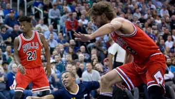 Nov 17, 2016; Salt Lake City, UT, USA; Utah Jazz guard Dante Exum (11) loses control of the ball as Chicago Bulls center Robin Lopez (8) defends during the second half at Vivint Smart Home Arena. Chicago won 85-77. Mandatory Credit: Russ Isabella-USA TODAY Sports