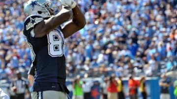 Sep 14, 2014; Nashville, TN, USA; Dallas Cowboys wide receiver Dez Bryant (88) jesters to the fans after scoring a touchdown against the Tennessee Titans during the second half at LP Field. Dallas won 26-10. Mandatory Credit: Jim Brown-USA TODAY Sports