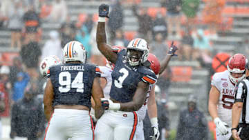 Auburn footballOct 10, 2020; Auburn, Alabama, USA; Auburn Tigers defensive end Zykeivous Walker (3) celebrates sacking Arkansas Razorbacks quarterback Feleipe Franks (13) during the first quarter at Jordan-Hare Stadium. Mandatory Credit: John David Mercer-USA TODAY Sports