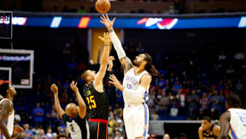 TULSA, OK - OCTOBER 7: Steven Adams #12 of the Oklahoma City Thunder and Alex Len #25 of the Atlanta Hawks jump for tip-off during a pre-season game on October 7, 2018 at BOK Center, in Tulsa, Oklahoma. NOTE TO USER: User expressly acknowledges and agrees that, by downloading and/or using this Photograph, user is consenting to the terms and conditions of the Getty Images License Agreement. Mandatory Copyright Notice: Copyright 2018 NBAE (Photo by Shane Bevel/NBAE via Getty Images)