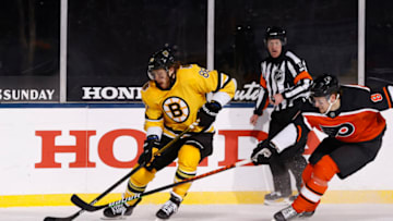 David Pastrnak, Boston Bruins and Robert Hagg, Philadelphia Flyers (Photo by Christian Petersen/Getty Images)