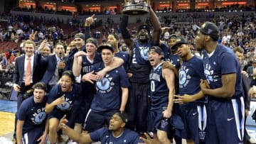 Mar 26, 2016; Louisville, KY, USA; The Villanova Wildcats celebrates after beating the Kansas Jayhawks in the south regional final of the NCAA Tournament at KFC YUM!. Mandatory Credit: Jamie Rhodes-USA TODAY Sports