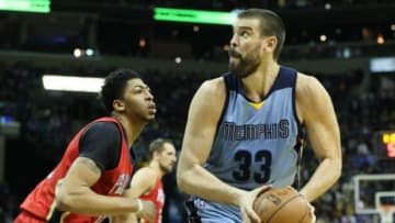 Jan 18, 2016; Memphis, TN, USA; Memphis Grizzlies center Marc Gasol (33) looks to shoot as New Orleans Pelicans forward Anthony Davis (23) defends at FedExForum. Memphis defeated New Orleans 101-99. Mandatory Credit: Nelson Chenault-USA TODAY Sports