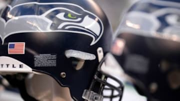 Dec 15, 2013; East Rutherford, NJ, USA; A look at a Seattle Seahawks helmet at the bench area against the New York Giants at MetLife Stadium. The Seahawks won the game 23-0. Mandatory Credit: Joe Camporeale-USA TODAY Sports