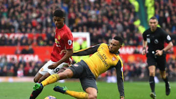 MANCHESTER, ENGLAND - NOVEMBER 19: Marcus Rashford of Manchester United (L) is tackled by Francis Coquelin of Arsenal (R) during the Premier League match between Manchester United and Arsenal at Old Trafford on November 19, 2016 in Manchester, England. (Photo by Shaun Botterill/Getty Images)