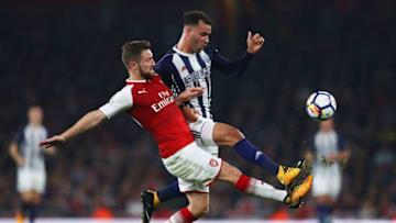 LONDON, ENGLAND - SEPTEMBER 25: Hal Robson-Kanu of West Bromwich Albion and Shkodran Mustafi of Arsenal battle for the ball during the Premier League match between Arsenal and West Bromwich Albion at Emirates Stadium on September 25, 2017 in London, England. (Photo by Michael Steele/Getty Images)