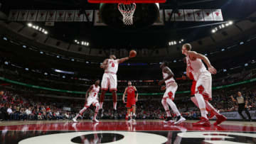 CHICAGO, IL - OCTOBER 13: Cristiano Felicio #6 of the Chicago Bulls grabs the rebound against the Toronto Raptors on October 13, 2017 at the United Center in Chicago, Illinois. NOTE TO USER: User expressly acknowledges and agrees that, by downloading and or using this photograph, user is consenting to the terms and conditions of the Getty Images License Agreement. Mandatory Copyright Notice: Copyright 2017 NBAE (Photo by Jeff Haynes/NBAE via Getty Images)
