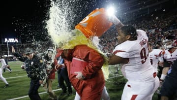 MEMPHIS, TN - JANUARY 2: Head coach Bret Bielema of the Arkansas Razorbacks is doused with Gatorade following the AutoZone Liberty Bowl win against the Kansas State Wildcats at Liberty Bowl Memorial Stadium on January 2, 2016 in Memphis, Tennessee. Arkansas won 45-23. (Photo by Joe Robbins/Getty Images)