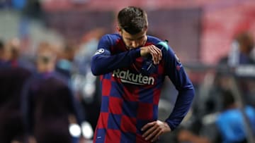 Barcelona's Gerard Pique reacts at the end of the match between Barcelona and Bayern Munich. (Photo by Rafael Marchante / POOL / AFP) (Photo by RAFAEL MARCHANTE/POOL/AFP via Getty Images)