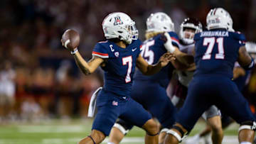 Sep 10, 2022; Tucson, Arizona, USA; Arizona Wildcats quarterback Jayden de Laura (7) against the Mississippi State Bulldogs at Arizona Stadium. Mandatory Credit: Mark J. Rebilas-USA TODAY Sports