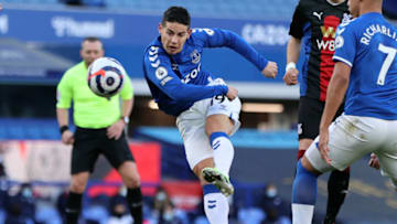 Everton's Colombian midfielder James Rodriguez has an unsuccessful shot during the English Premier League football match between Everton and Crystal Palace at Goodison Park in Liverpool, north west England on April 5, 2021. - RESTRICTED TO EDITORIAL USE. No use with unauthorized audio, video, data, fixture lists, club/league logos or 'live' services. Online in-match use limited to 120 images. An additional 40 images may be used in extra time. No video emulation. Social media in-match use limited to 120 images. An additional 40 images may be used in extra time. No use in betting publications, games or single club/league/player publications. (Photo by Clive Brunskill / POOL / AFP) / RESTRICTED TO EDITORIAL USE. No use with unauthorized audio, video, data, fixture lists, club/league logos or 'live' services. Online in-match use limited to 120 images. An additional 40 images may be used in extra time. No video emulation. Social media in-match use limited to 120 images. An additional 40 images may be used in extra time. No use in betting publications, games or single club/league/player publications. / RESTRICTED TO EDITORIAL USE. No use with unauthorized audio, video, data, fixture lists, club/league logos or 'live' services. Online in-match use limited to 120 images. An additional 40 images may be used in extra time. No video emulation. Social media in-match use limited to 120 images. An additional 40 images may be used in extra time. No use in betting publications, games or single club/league/player publications. (Photo by CLIVE BRUNSKILL/POOL/AFP via Getty Images)
