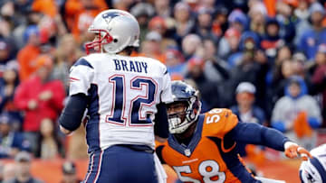 Jan 24, 2016; Denver, CO, USA; Denver Broncos outside linebacker Von Miller (58) sacks New England Patriots quarterback Tom Brady (12) during the game in the AFC Championship football game at Sports Authority Field at Mile High. Mandatory Credit: Kevin Jairaj-USA TODAY Sports