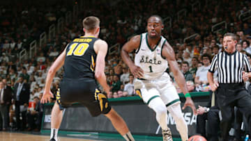 EAST LANSING, MI - DECEMBER 03: Joshua Langford #1 of the Michigan State Spartans drives past Joe Wieskamp #10 of the Iowa Hawkeyes in the first half at Breslin Center on December 3, 2018 in East Lansing, Michigan. (Photo by Rey Del Rio/Getty Images)