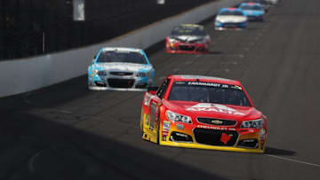 Jul 24, 2016; Indianapolis, IN, USA; NASCAR Sprint Cup driver Jeff Gordon (88) filling in for Dale Earnhardt Jr. (not pictured) drives into turn one during the Combat Wounded Coalition 400 at the Brickyard at the Indianapolis Motor Speedway. Mandatory Credit: Brian Spurlock-USA TODAY Sports