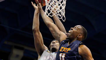 Mar 4, 2021; Lawrence, Kansas, USA; Kansas Jayhawks forward David McCormack (33) and UTEP Miners forward Bryson Williams (11) fight for a rebound during the first half at Allen Fieldhouse. Mandatory Credit: Denny Medley-USA TODAY Sports
