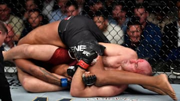 LAS VEGAS, NEVADA - JANUARY 18: Aleksei Oleinik of Russia submits Maurice Greene in their heavyweight fight during the UFC 246 event at T-Mobile Arena on January 18, 2020 in Las Vegas, Nevada. (Photo by Jeff Bottari/Zuffa LLC via Getty Images)