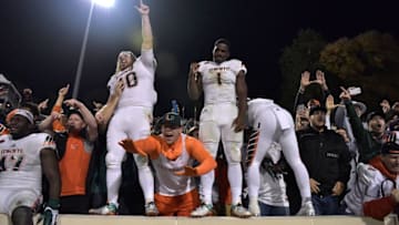DURHAM, NC - OCTOBER 31: Miami Hurricanes players and fans celebrate after a win against the Duke Blue Devils at Wallace Wade Stadium on October 31, 2015 in Durham, North Carolina. Miami won 30-27 on a last-second touchdown. (Photo by Grant Halverson/Getty Images)