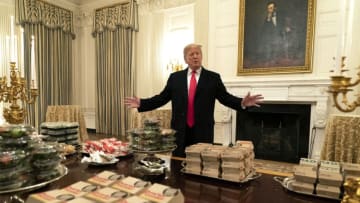 WASHINGTON, DC - JANUARY 14: (AFP OUT) U.S President Donald Trump presents fast food to be served to the Clemson Tigers football team to celebrate their Championship at the White House on January 14, 2019 in Washington, DC. (Photo by Chris Kleponis-Pool/Getty Images)