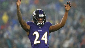 BALTIMORE, MARYLAND - DECEMBER 29: Cornerback Marcus Peters #24 of the Baltimore Ravens acknowledges the crowd against the Pittsburgh Steelers during the first quarter at M&T Bank Stadium on December 29, 2019 in Baltimore, Maryland. (Photo by Scott Taetsch/Getty Images)
