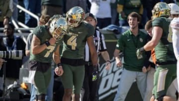 Dec 5, 2015; Waco, TX, USA; Baylor Bears wide receiver Lynx Hawthorne (7) and wide receiver Jay Lee (4) celebrate the touchdown by Hawthorne (7) against the Texas Longhorns during the second half at McLane Stadium. The Longhorns defeat the Bears 23-17. Mandatory Credit: Jerome Miron-USA TODAY Sports