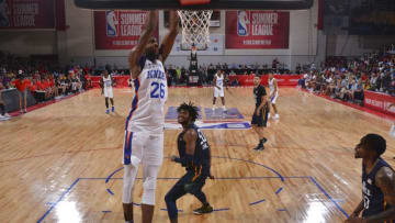 LAS VEGAS, NV - JULY 8: Mitchell Robinson #26 of the New York Knicks dunks the ball against the Utah Jazz during the 2018 Las Vegas Summer League on July 8, 2018 at the Cox Pavilion in Las Vegas, Nevada. NOTE TO USER: User expressly acknowledges and agrees that, by downloading and/or using this Photograph, user is consenting to the terms and conditions of the Getty Images License Agreement. Mandatory Copyright Notice: Copyright 2018 NBAE (Photo by Bart Young/NBAE via Getty Images)