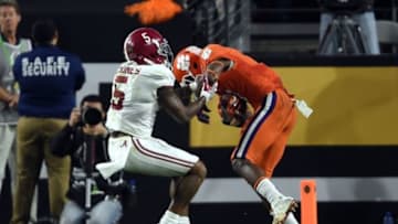 Jan 11, 2016; Glendale, AZ, USA; Clemson Tigers wide receiver Artavis Scott (3) makes a touchdown during the fourth quarter against Alabama Crimson Tide defensive back Cyrus Jones (5) in the 2016 CFP National Championship at University of Phoenix Stadium. Mandatory Credit: Joe Camporeale-USA TODAY Sports