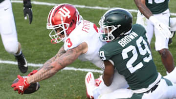 Nov 14, 2020; East Lansing, Michigan, USA; Indiana Hoosiers wide receiver Ty Fryfogle (3) runs for a touchdown as Michigan State Spartans cornerback Shakur Brown (29) attempts to tackle during the first quarter at Spartan Stadium. Mandatory Credit: Tim Fuller-USA TODAY Sports