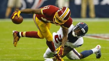 Sep 7, 2014; Houston, TX, USA; Washington Redskins wide receiver DeSean Jackson (11) runs with the ball as Houston Texans cornerback Johnathan Joseph (24) defends during the game at NRG Stadium. Mandatory Credit: Kevin Jairaj-USA TODAY Sports
