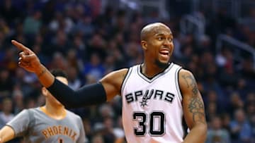 Jan 21, 2016; Phoenix, AZ, USA; San Antonio Spurs forward David West (30) reacts against the Phoenix Suns at Talking Stick Resort Arena. The Spurs defeated the Suns 117-89. Mandatory Credit: Mark J. Rebilas-USA TODAY Sports