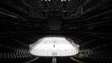 WASHINGTON, DC - MARCH 12: Sam Hess, Operations with Monumental Sports & Entertainment, skates alone prior Detroit Red Wings playing against the Washington Capitals at Capital One Arena on March 12, 2020 in Washington, DC. Today the NHL announced is has suspended their season due to the uncertainty of the coronavirus (COVID-19) with hopes of returning. The NHL currently joins the NBA, MLS, as well as, other sporting events and leagues around the world suspending play because of the coronavirus outbreak. (Photo by Patrick Smith/Getty Images)