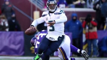 Jan 10, 2016; Minneapolis, MN, USA; Seattle Seahawks quarterback Russell Wilson (3) throws a pass against the Minnesota Vikings in the third quarter of a NFC Wild Card playoff football game at TCF Bank Stadium. Mandatory Credit: Brace Hemmelgarn-USA TODAY Sports